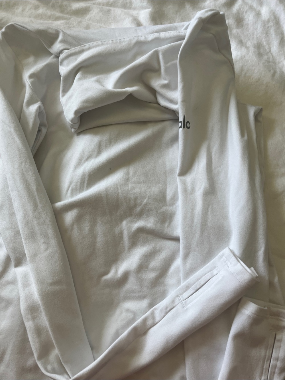 White full turtle neck top with thumb holes